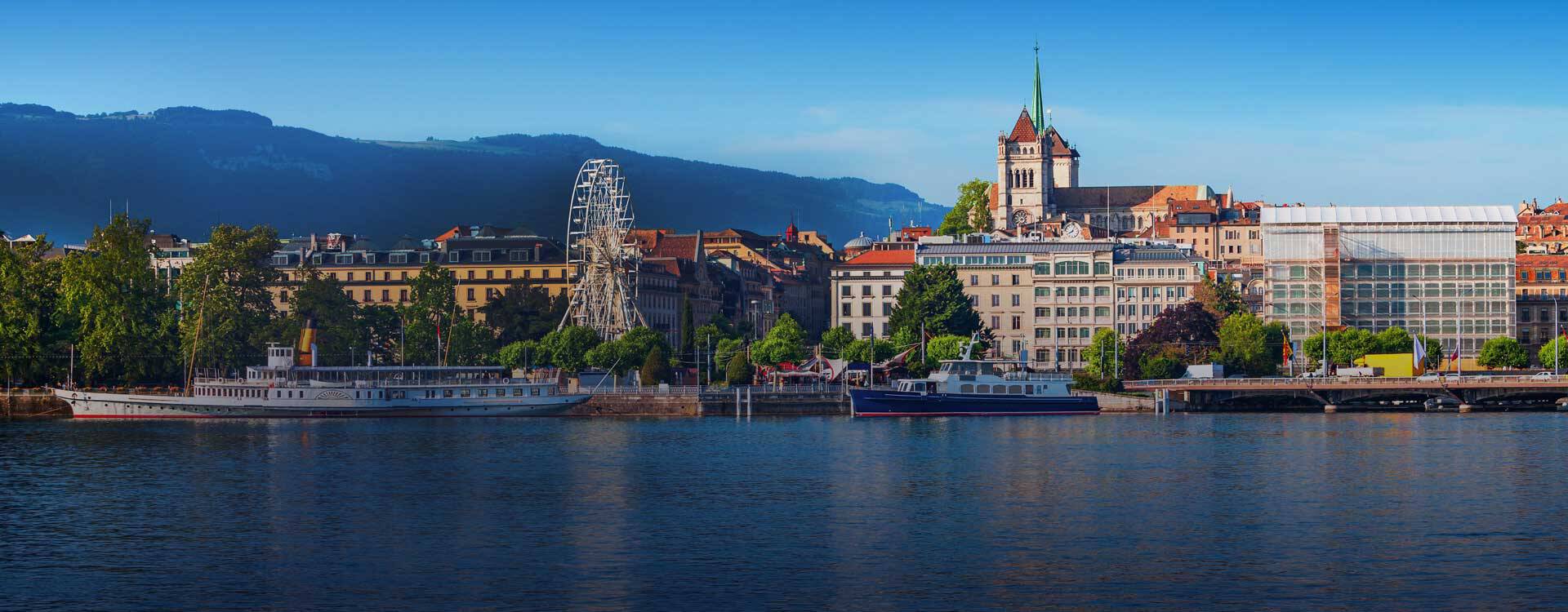 View of the English Garden in Geneva from across the lake